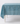 Blue tablecloth with white birds print on rectangular table.